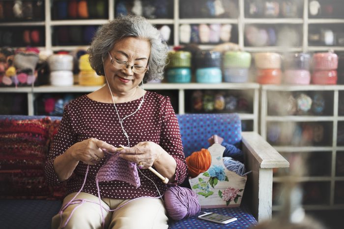 turn hobby into a side hustle | woman doing crochet