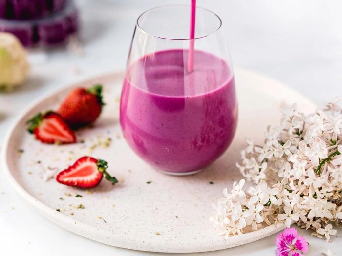 Purple evive smoothie in a glass