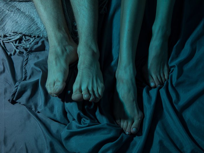 disabled sex | Close,up,of,male,and,female,feet,on,a,bed