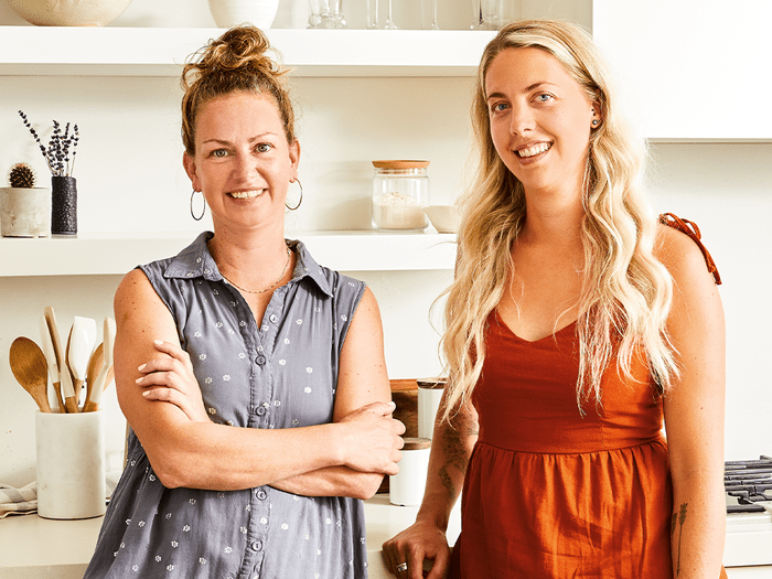holiday tips and tricks | portrait of bettina schormann and erin schiesgtel in a brightly lit kitchen