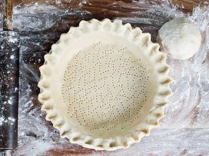 sweet pie dough recipe | Homemade,butter,pie,crust,in,pie,plate,with,fluted,pinched