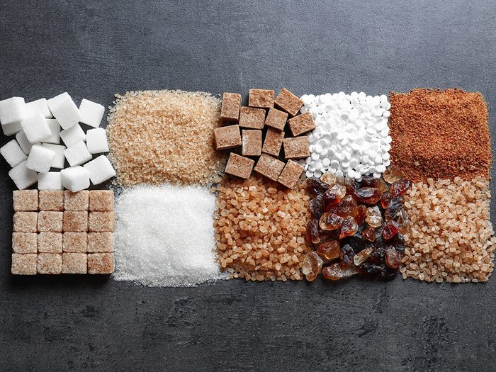 what,sugar,is,the,healthiest,Flat,lay,composition,with,different,types,of,sugar,on,gray