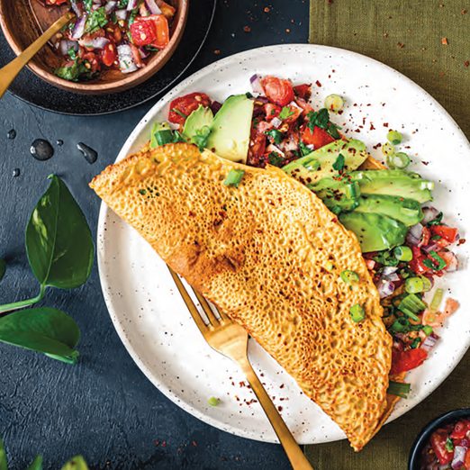 Start Your Morning With Crispy Chickpea Pancakes Topped with Avocado & Salsa