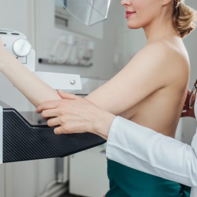 A woman having mammography examination at hospital.